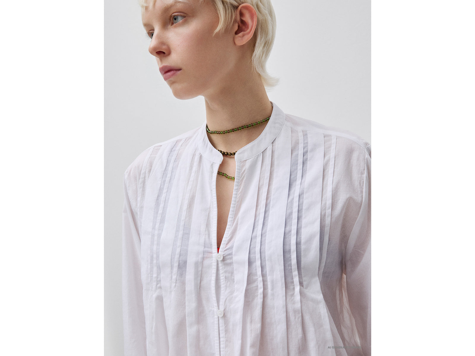 Lightweight blouse with pleats