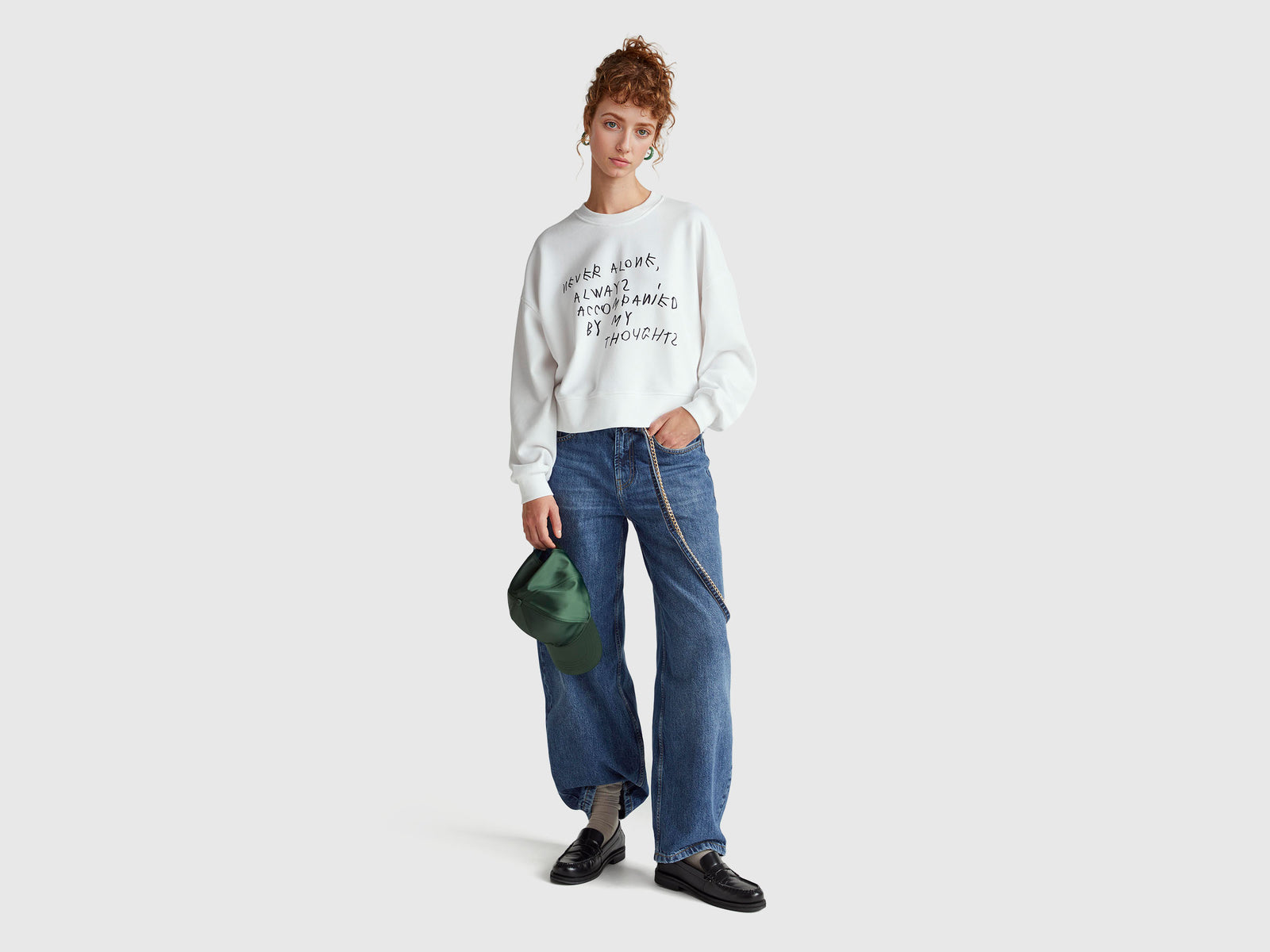 White sweatshirt with Coco Capitán embroidery