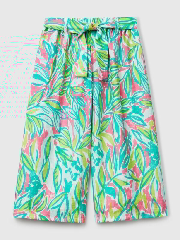 Pantalón palazzo con estampado tropical Niña