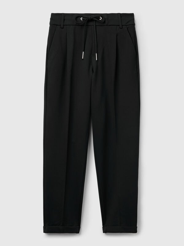 Pantalón de color liso con cordón Pantalón de color liso con cordón Mujer