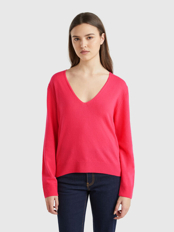 Jersey de pura lana merina con escote de pico Mujer