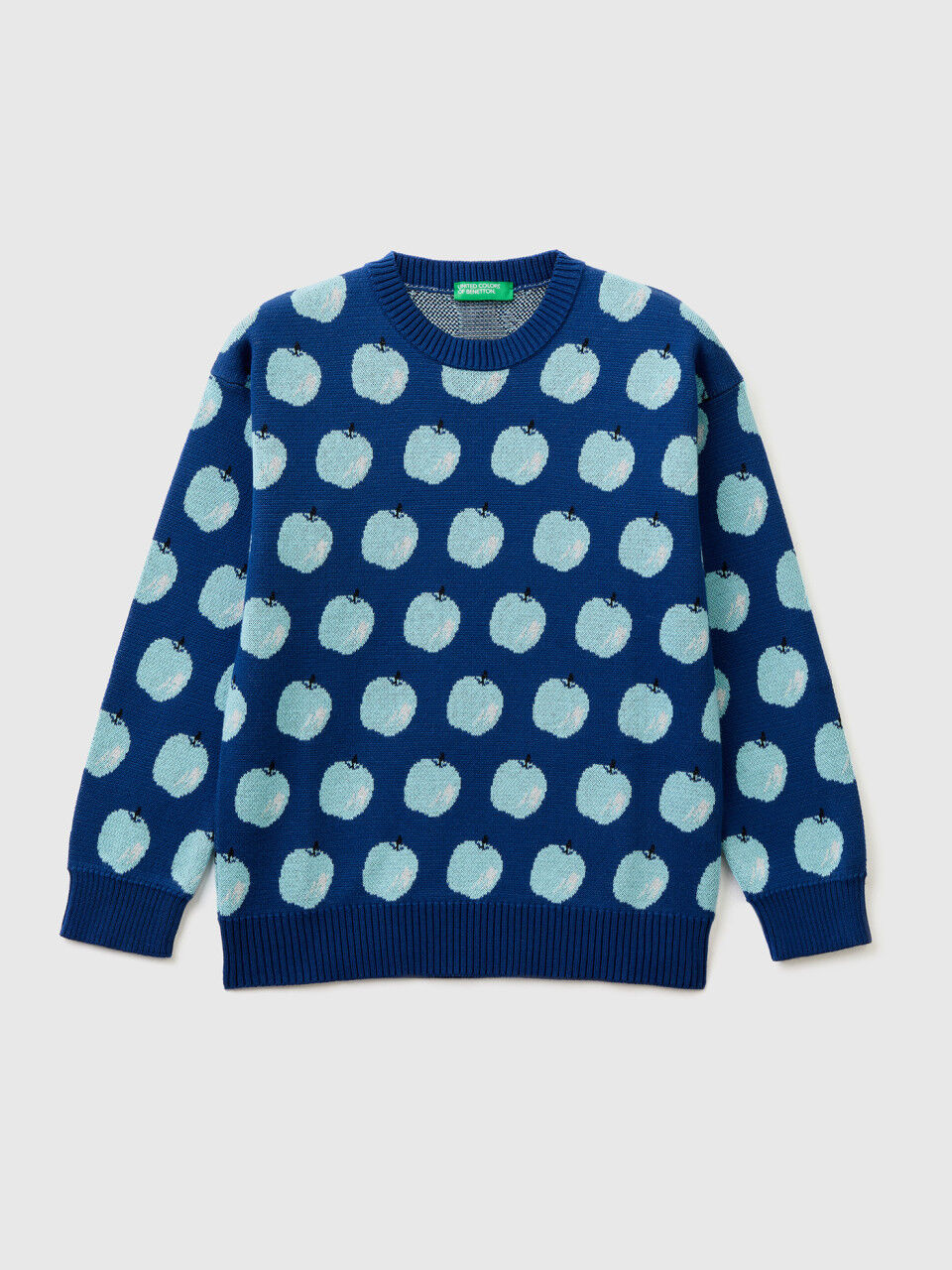 Jersey azul con estampado de manzanas