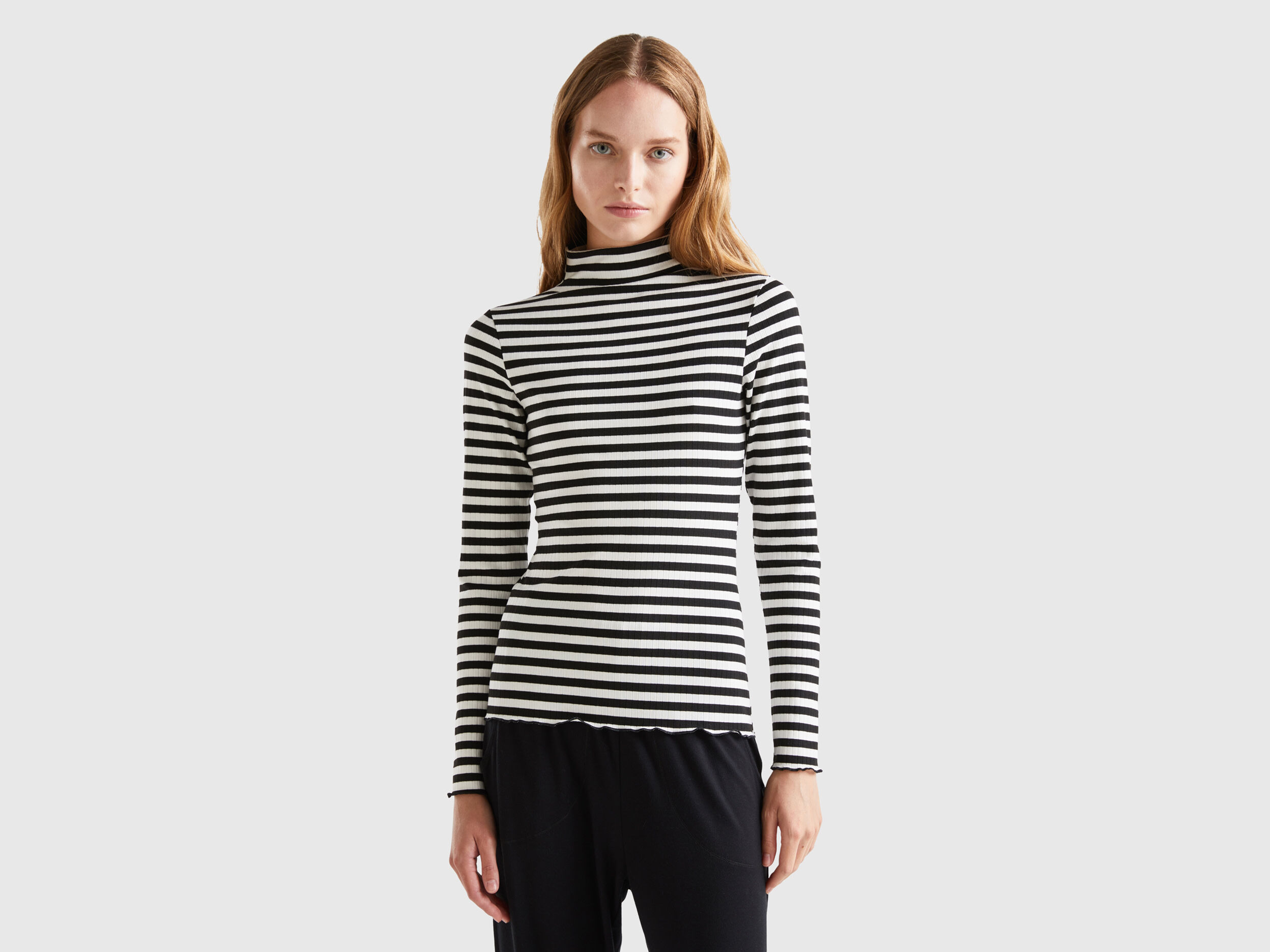 Camiseta de hotsell rayas cuello alto