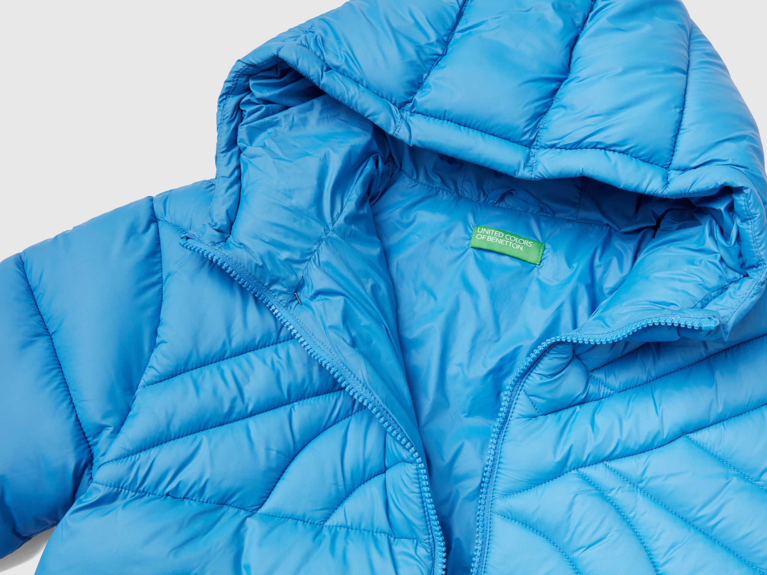 Benetton plumifero sale niño