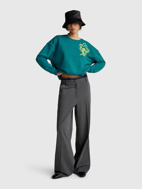 Sudadera de corte regular con aplicación Mujer