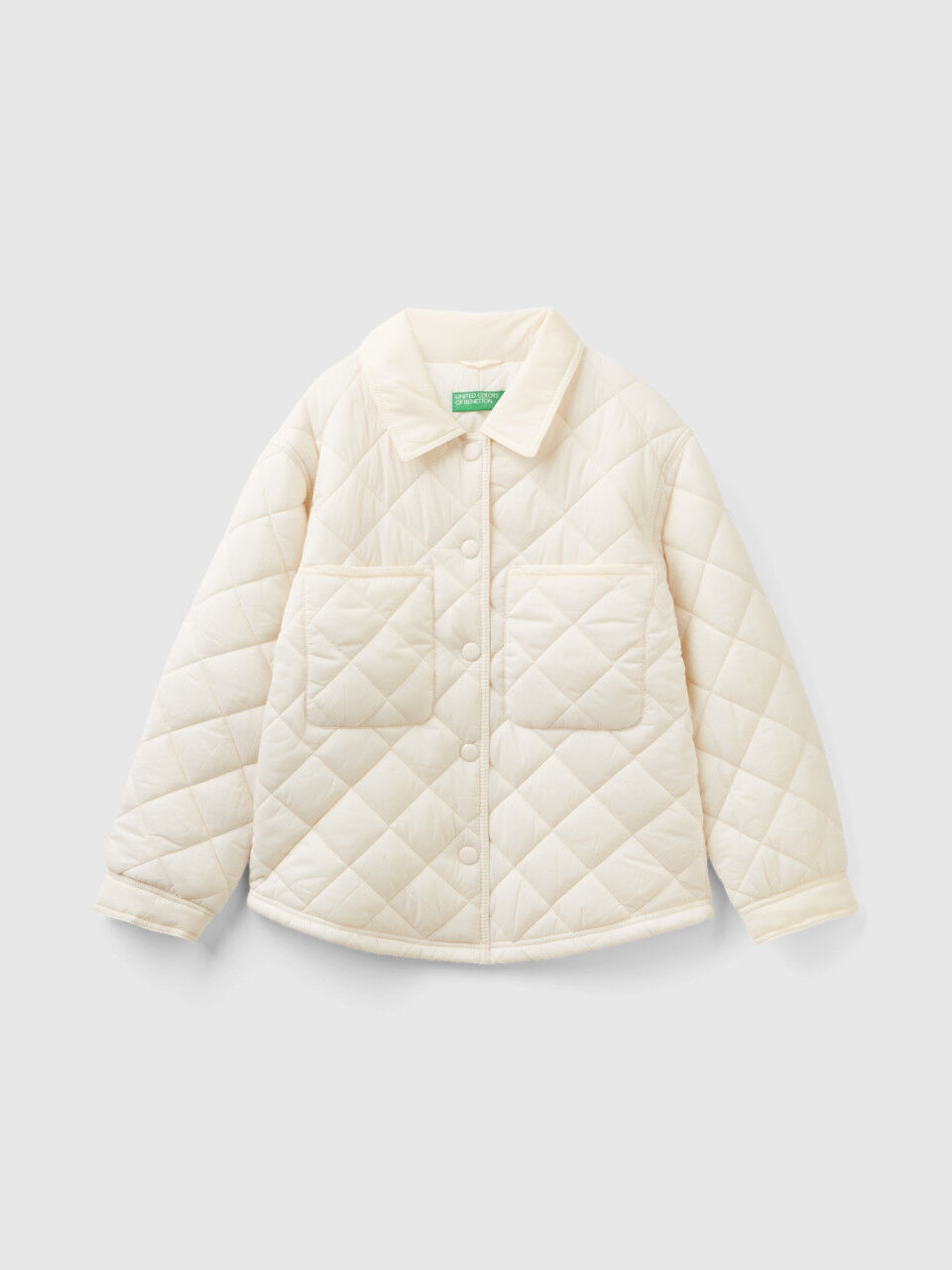 Benetton on sale plumiferos niña