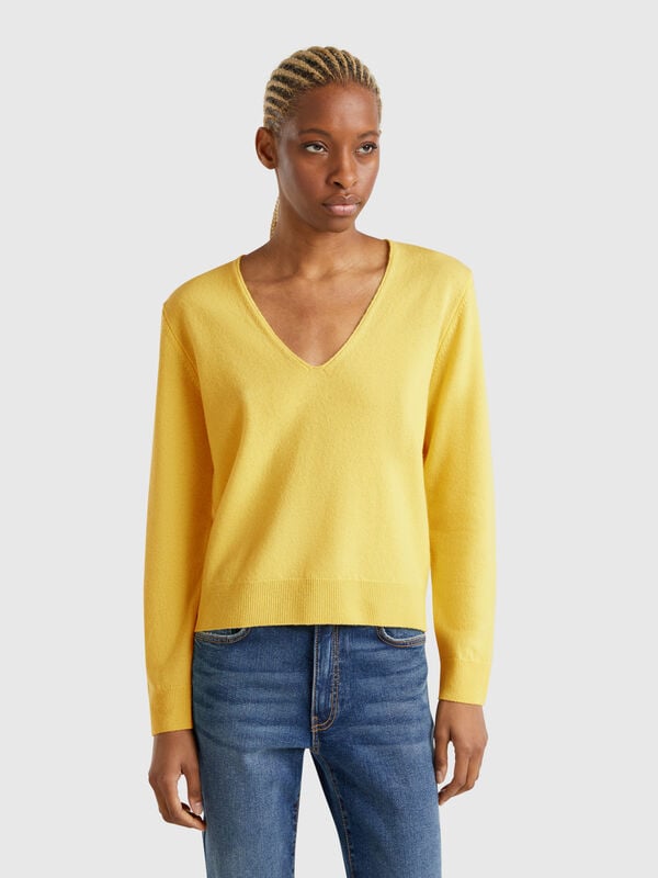 Jersey de pura lana merina con escote de pico Mujer
