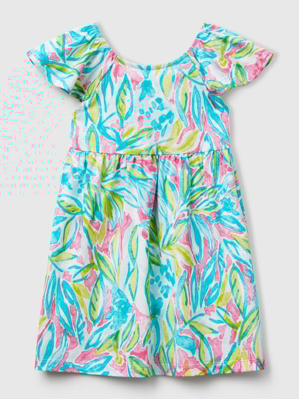 Vestido verde con estampado tropical. Niña