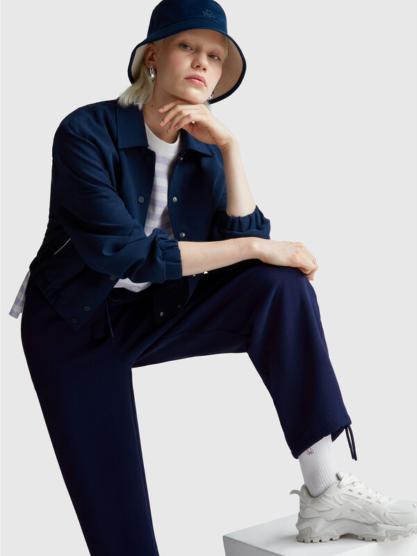 Pantalones con elástico y cordón Mujer