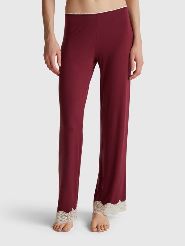 Pantalones fluidos con encaje Mujer