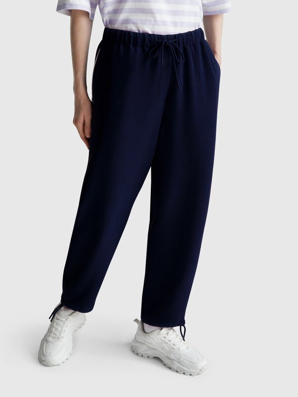 Pantalones con elástico y cordón Pantalones con elástico y cordón Mujer