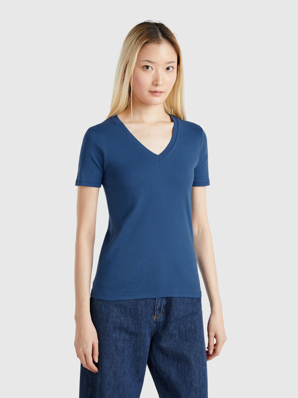 Camiseta en color azul de algodón puro con escote de pico Mujer