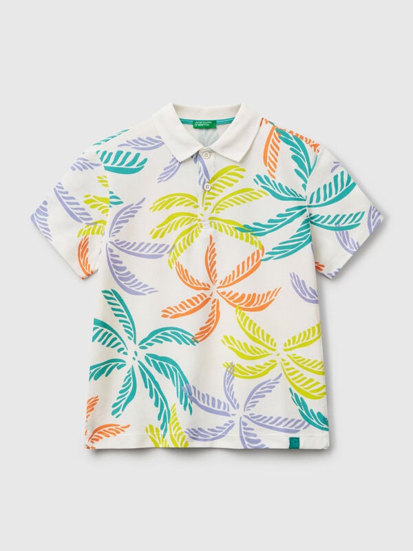 Polo blanco con estampado tropical Niño