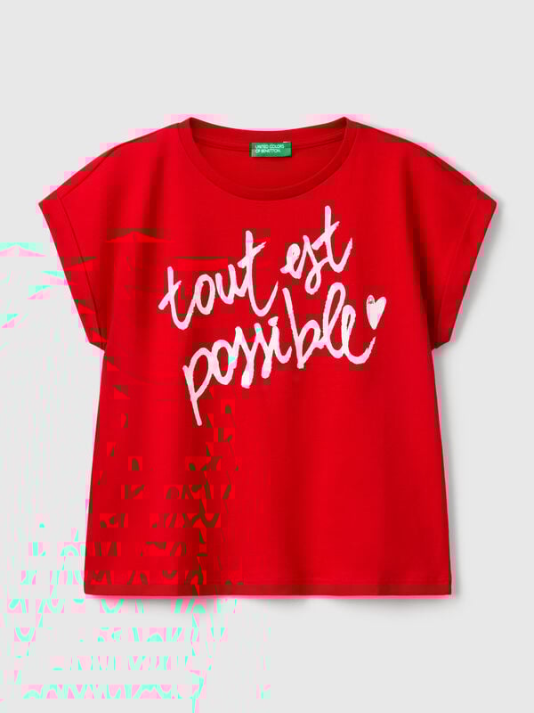 Camiseta boxy fit con estampado y purpurina Niña