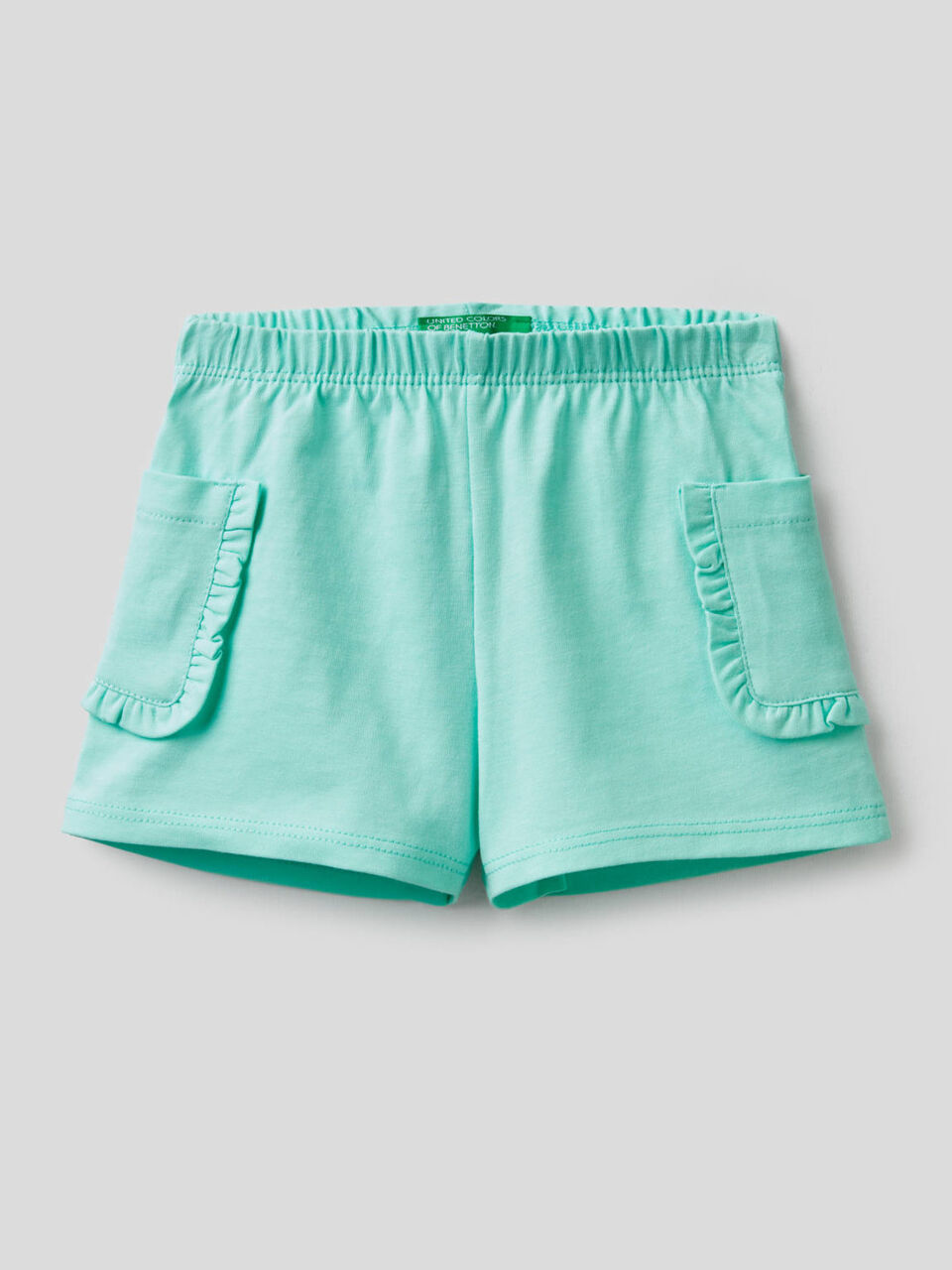 Pantalón corto con bolsillos y volantes image number 1