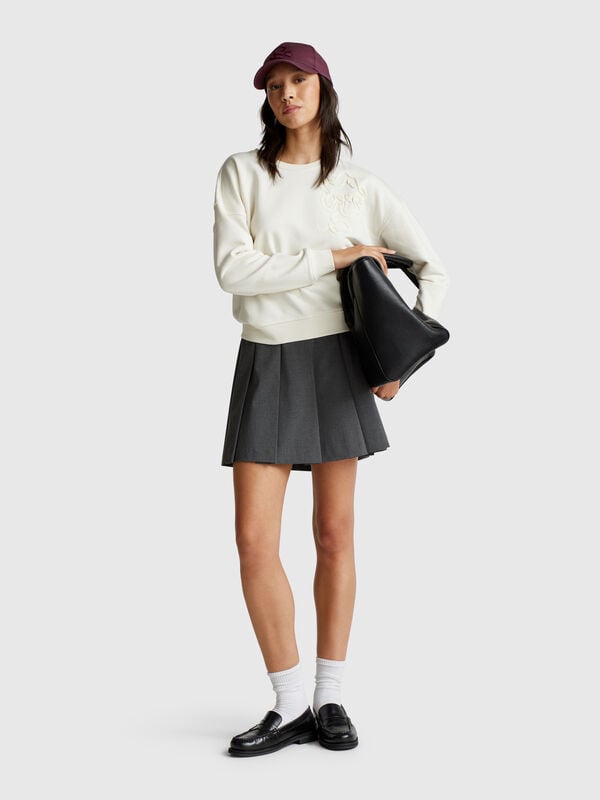 Sudadera de corte regular con aplicación Mujer