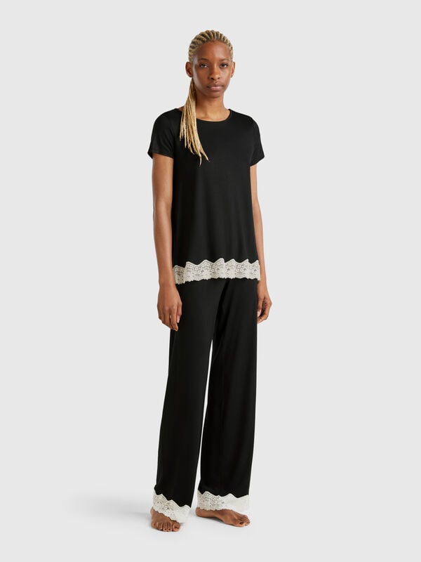 Pantalón fluido con detalles de encaje Mujer