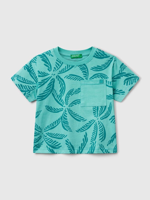Camiseta verde con estampado tropical Niño