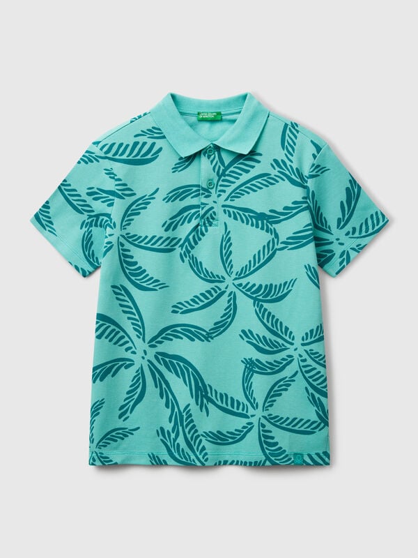 Polo verde con estampado tropical Niño