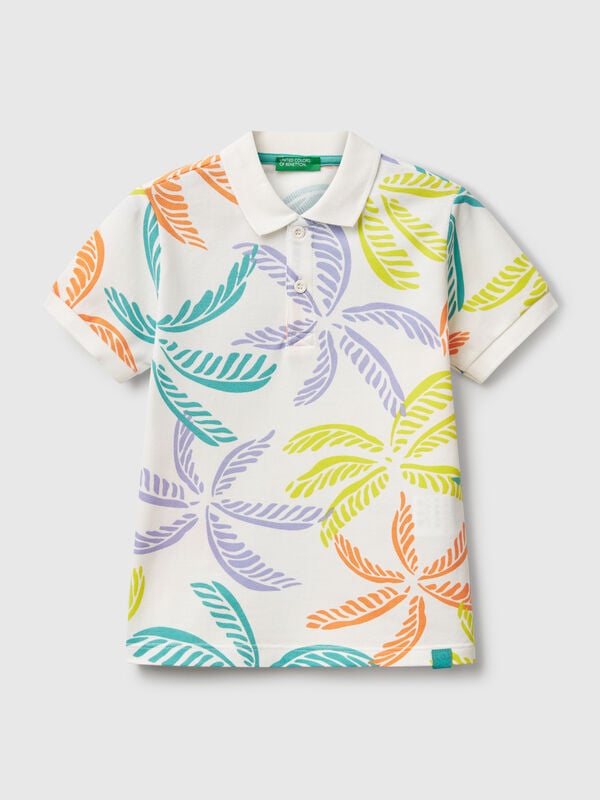 Polo blanco con estampado tropical Niño