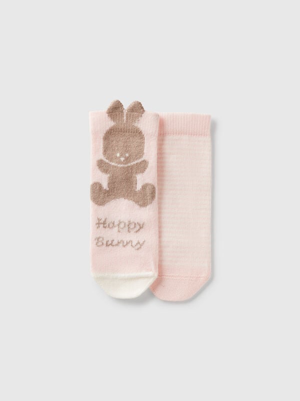 Conjunto de calcetines con rayas y conejito. Recién nacidos
