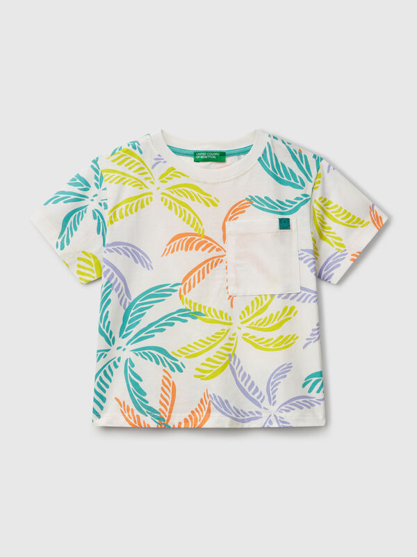 Camiseta blanca con estampado tropical Niño