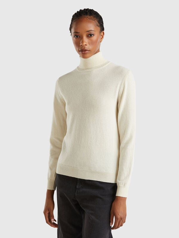 Jersey de cuello cisne color crema de pura lana merina Mujer
