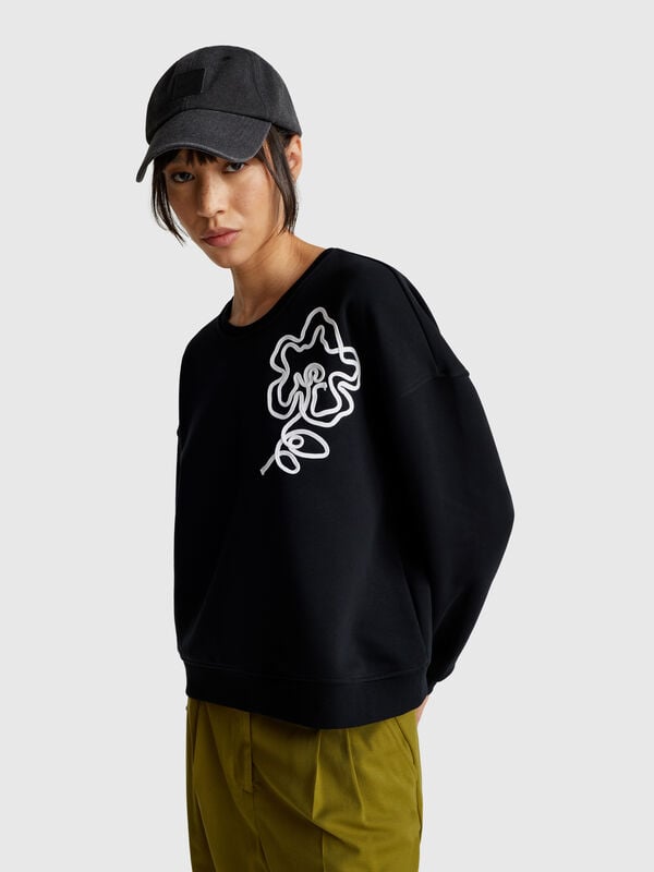 Sudadera de corte regular con aplicación Mujer