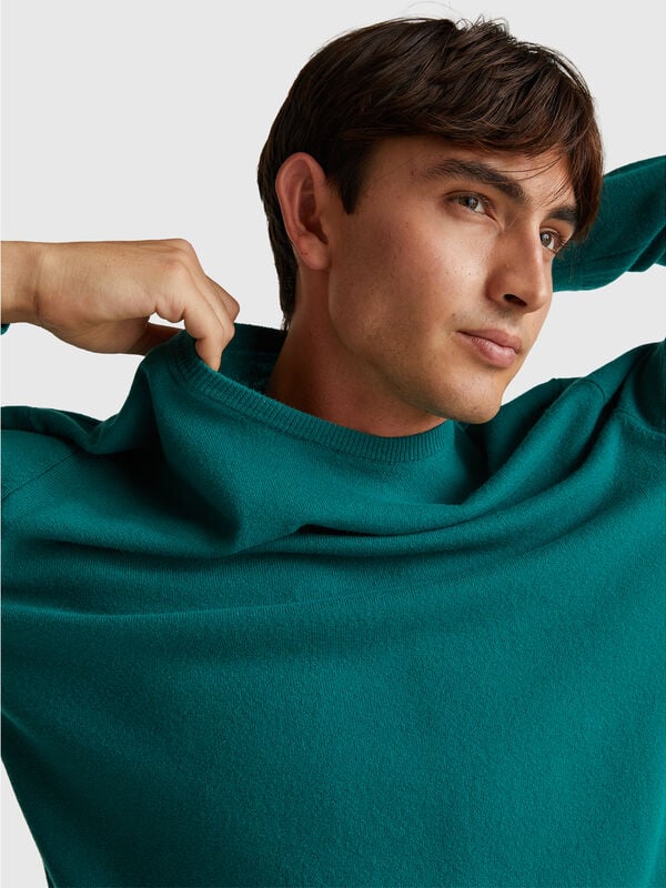 Suéter de cuello redondo verde bosque en pura lana merino Hombre